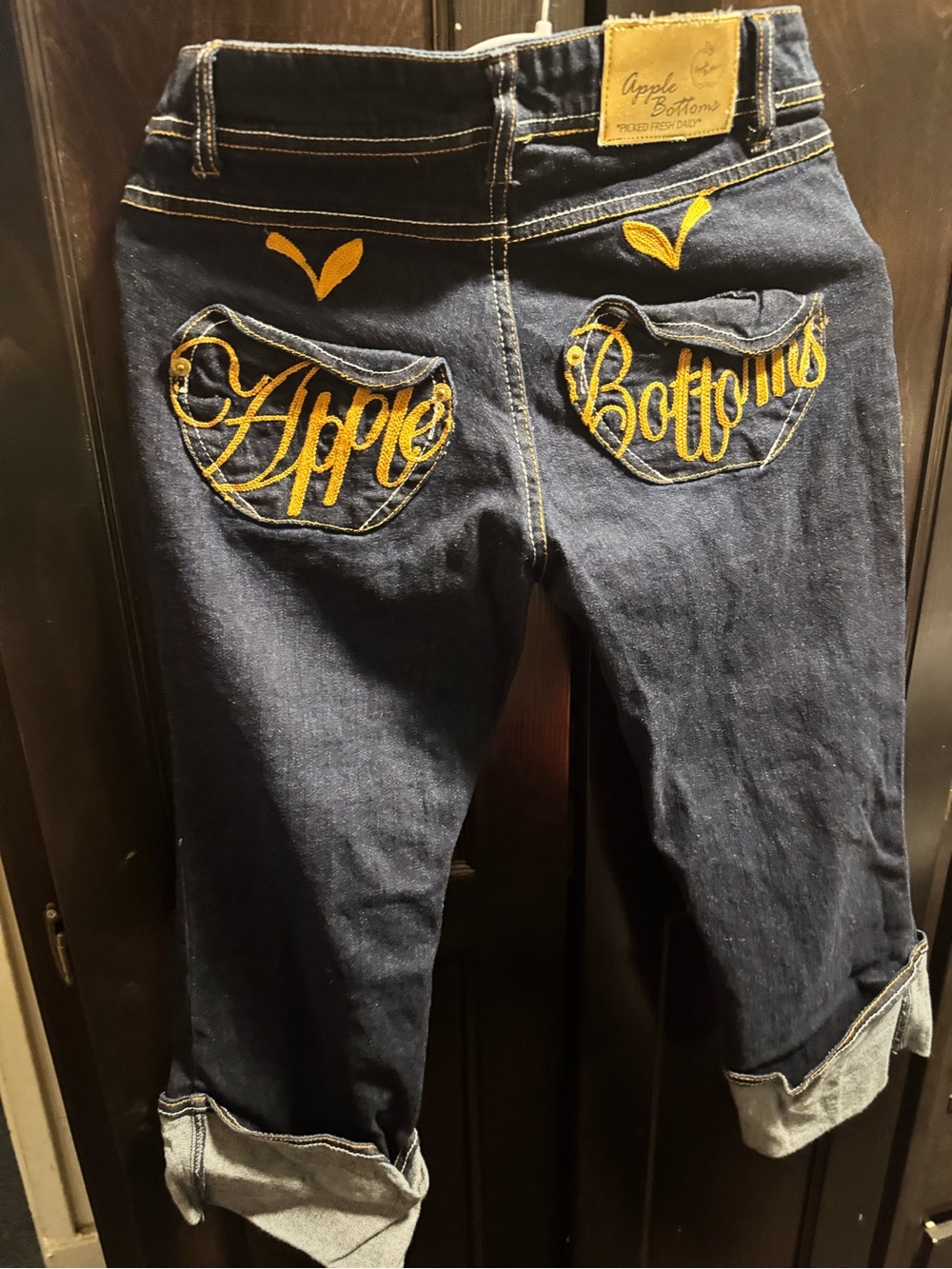 Apple Bottoms Dark Blue Cropped Jeans with Yellow Embroidery